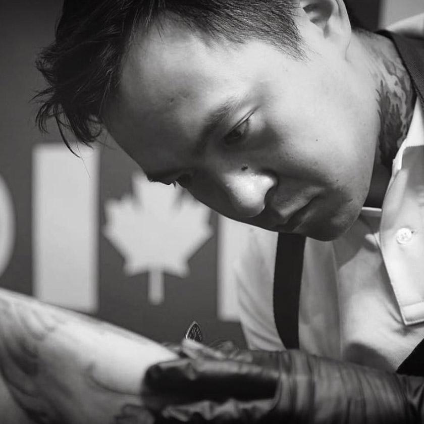 Tattoo artist using FYT tattoo supplies and needles in New York studio