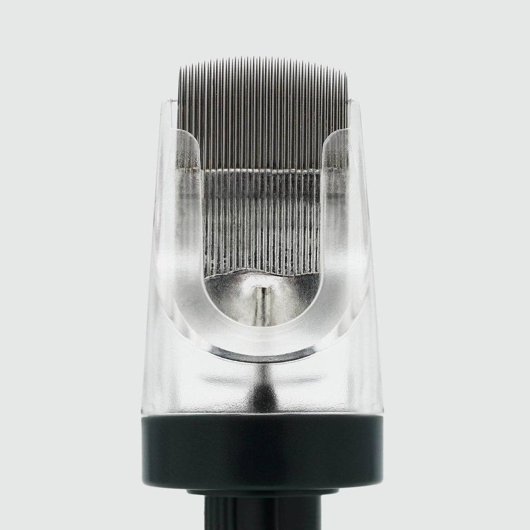 Close-up of FYT premium tattoo cartridge with silicone membrane and fine tattoo needles